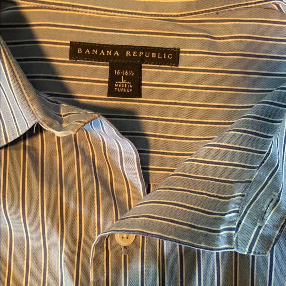 light blue pin-striped dress shirt. 16-16 ½ neck.